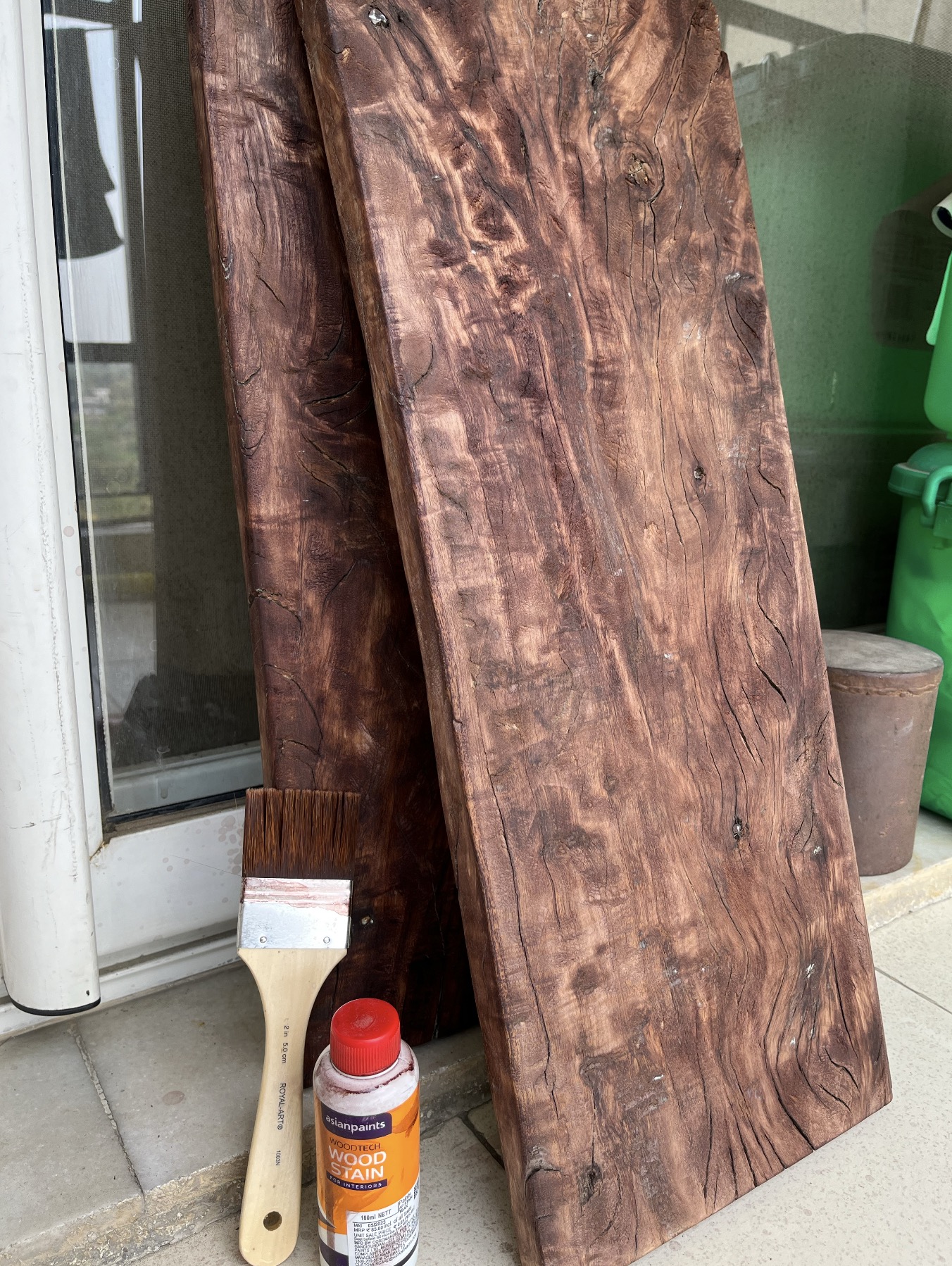 Polished planks with polish bottle and brush